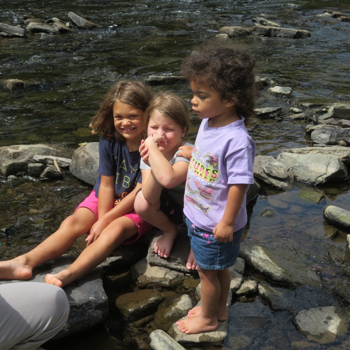 The three youngest girls at the water