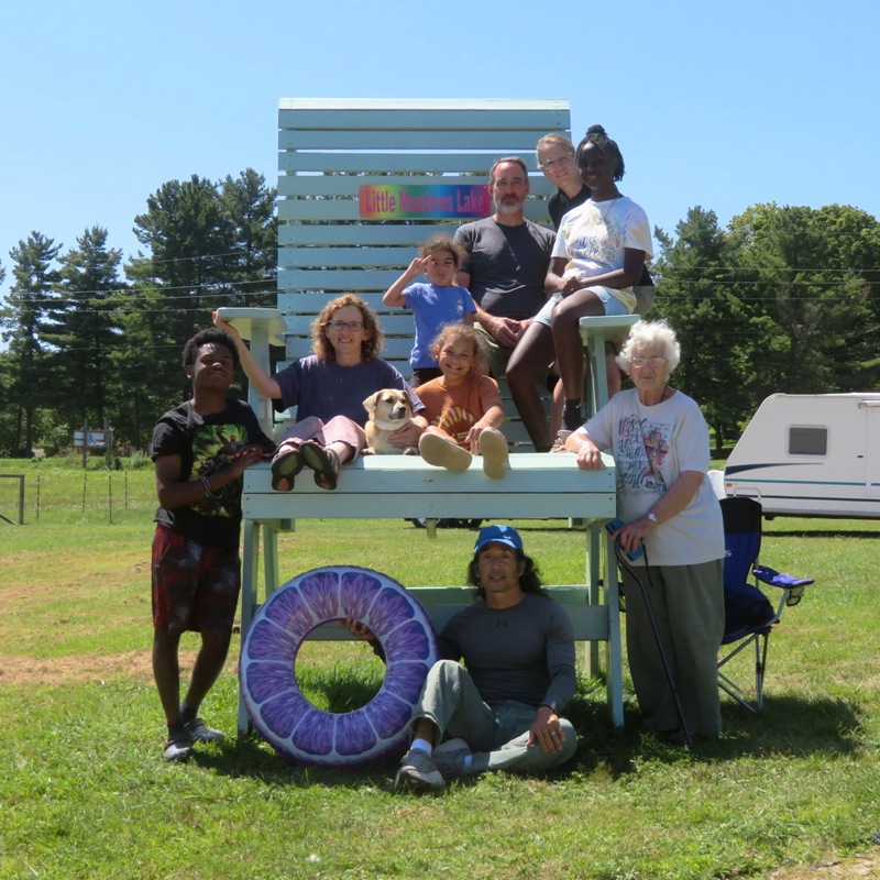 Group photo at giant lifeguard chair