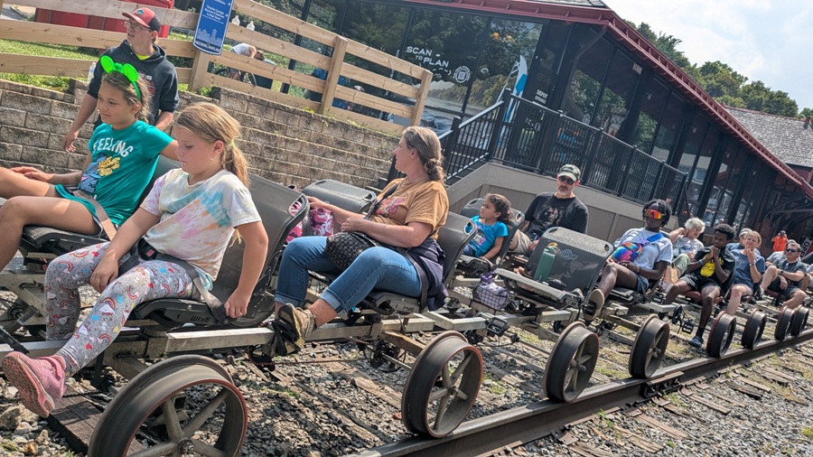 Norma and her family on the rail bikes