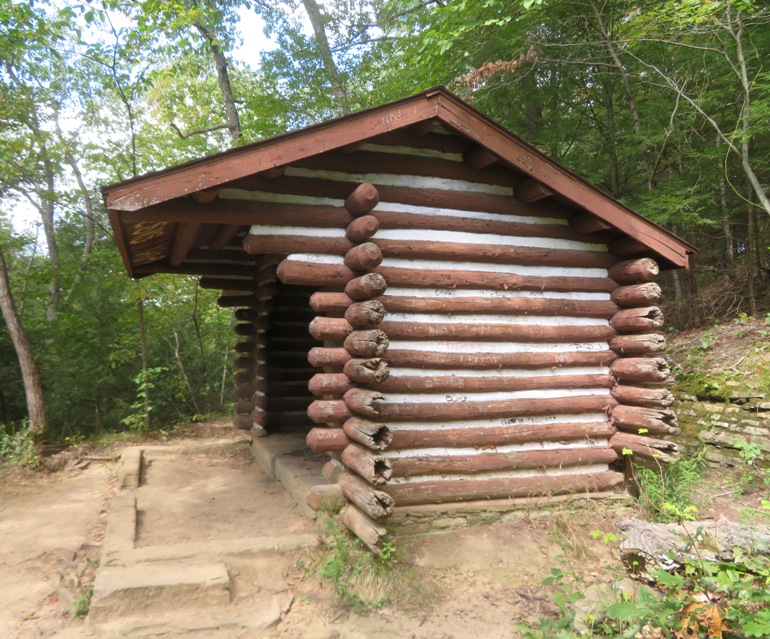 Side view of log shelter