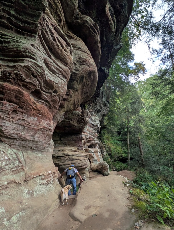 Daphne following me with a giant rock formation on our left