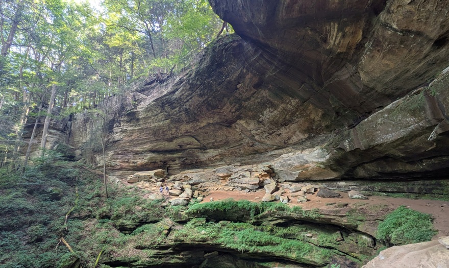 Another view of the cliffs with greenery at the base where things are moist