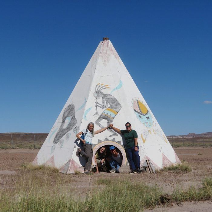 Norma and me inside a teepee with Carmen and Robin outside of it