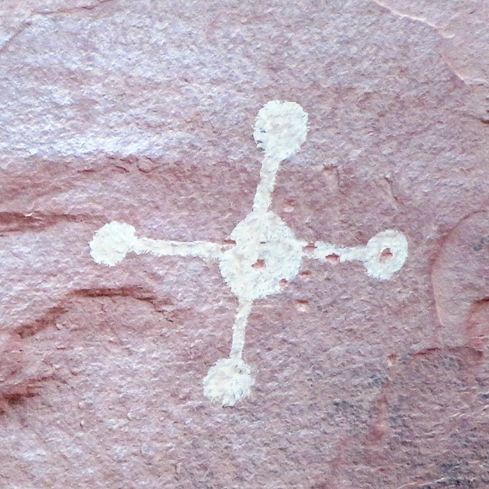 Petroglyph cross with dots at ends and center