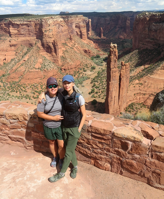 Robin and Carmen with Spider Rock behind