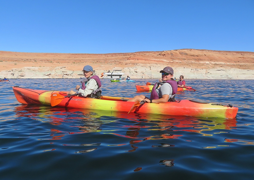 Side view of Carmen and Robin in their kayak
