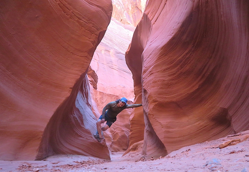 Me with hands and feet on rock walls
