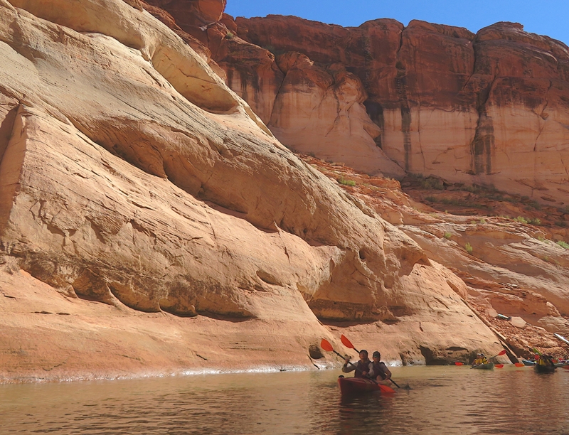 Well-lit canyon wall but kayaking in the shade