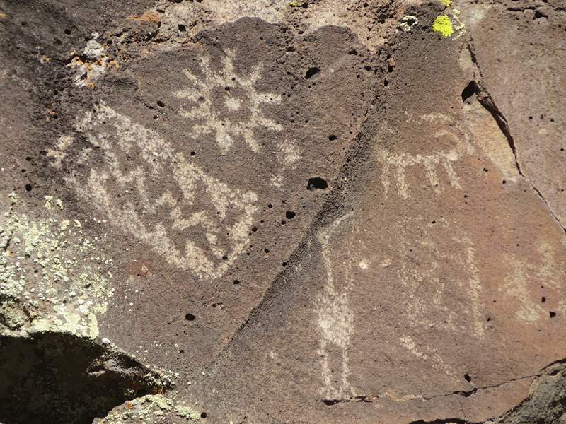 Zig zag pattern, sun, and other petroglyphs