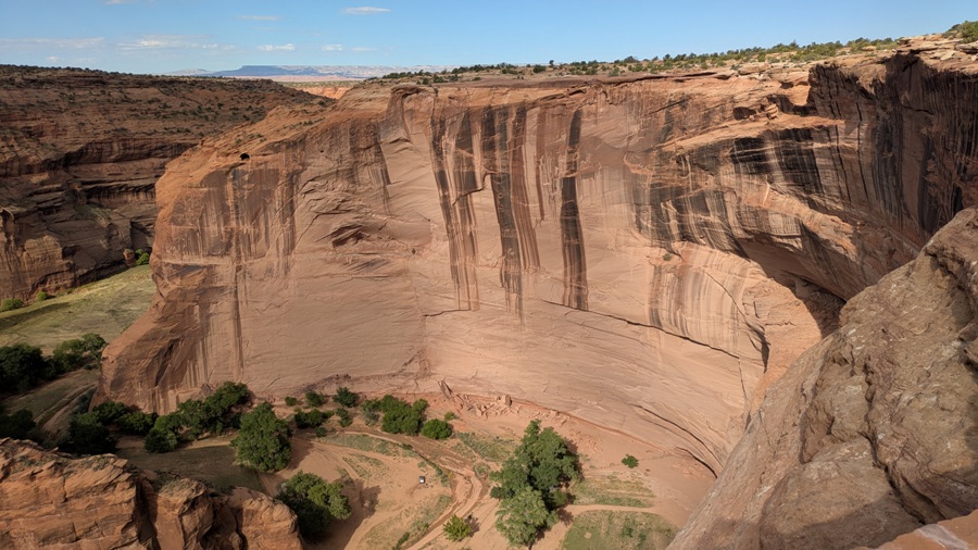 Cliff face with ruin at the base