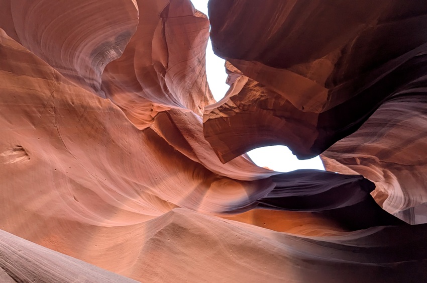 Looking up at sandstone walls