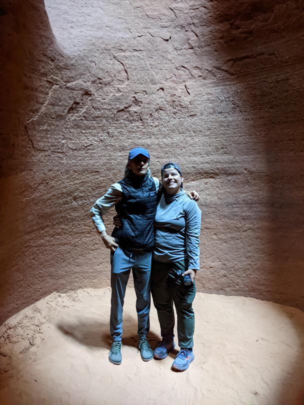 Carmen and Robin standing in the same place where Norma and I stood that had a mix of light and darkness