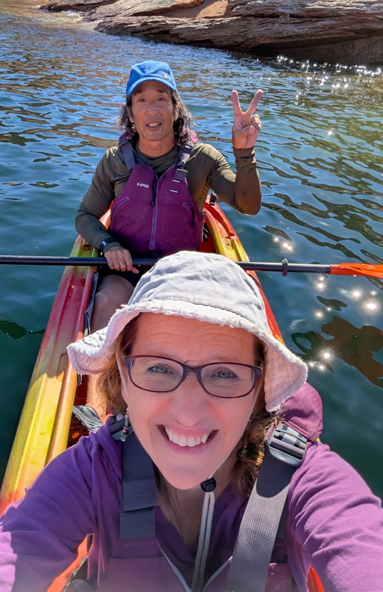 Norma taking a picture of me and her on the kayak