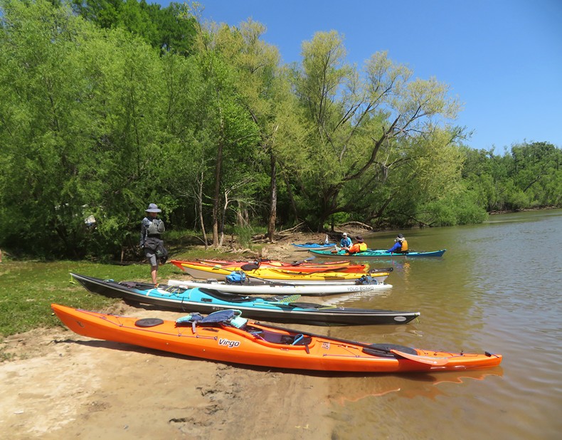Kayaks pulled up on the beach