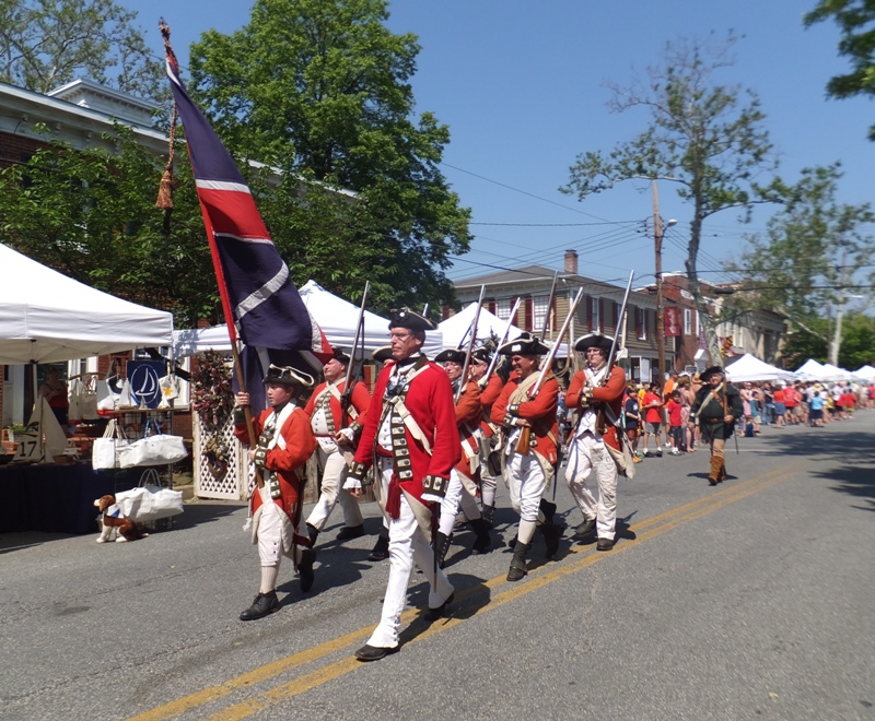 Men wearing colonial British uniforms