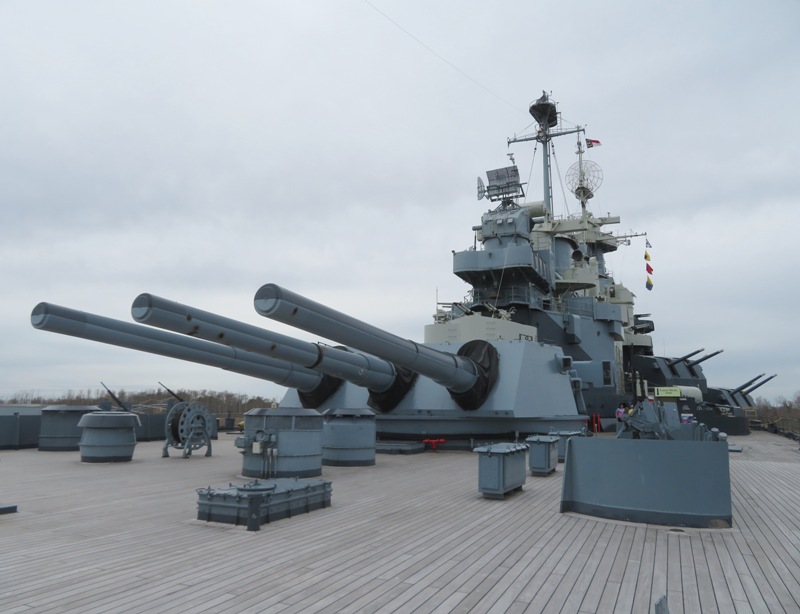 Side view of big guns on the USS North Carolina