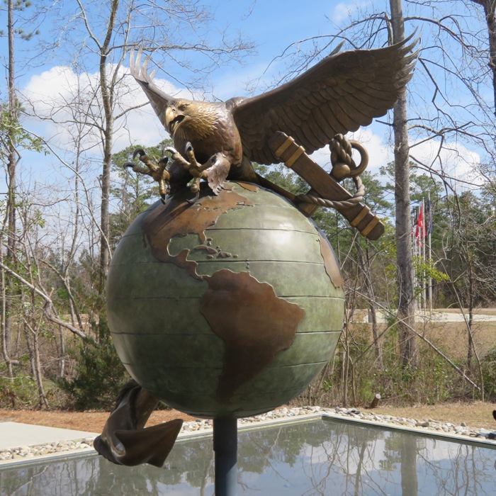 This eagle, globe, and anchor sculpture was crafted by David Turner and funded by the Marine Federal Credit Union. It stands in front of the future Museum of the Marine
