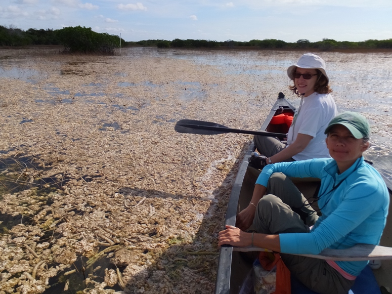 Norma and Carmen in canoe with periphyton covering the water
