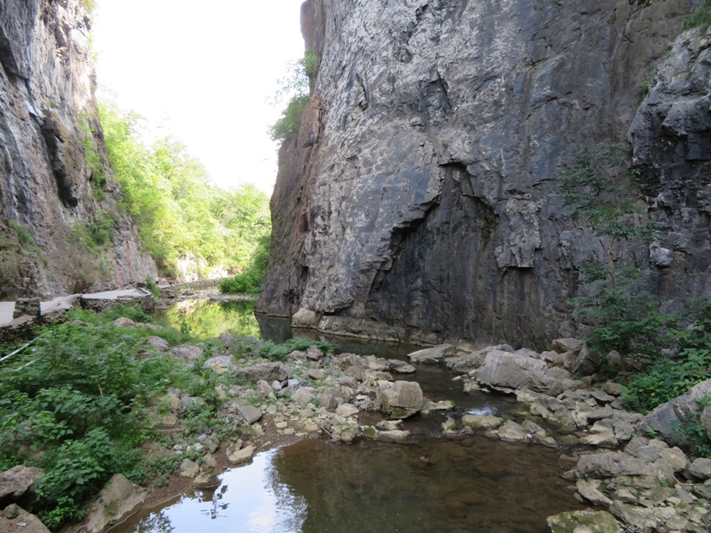 Rock wall by winding creek
