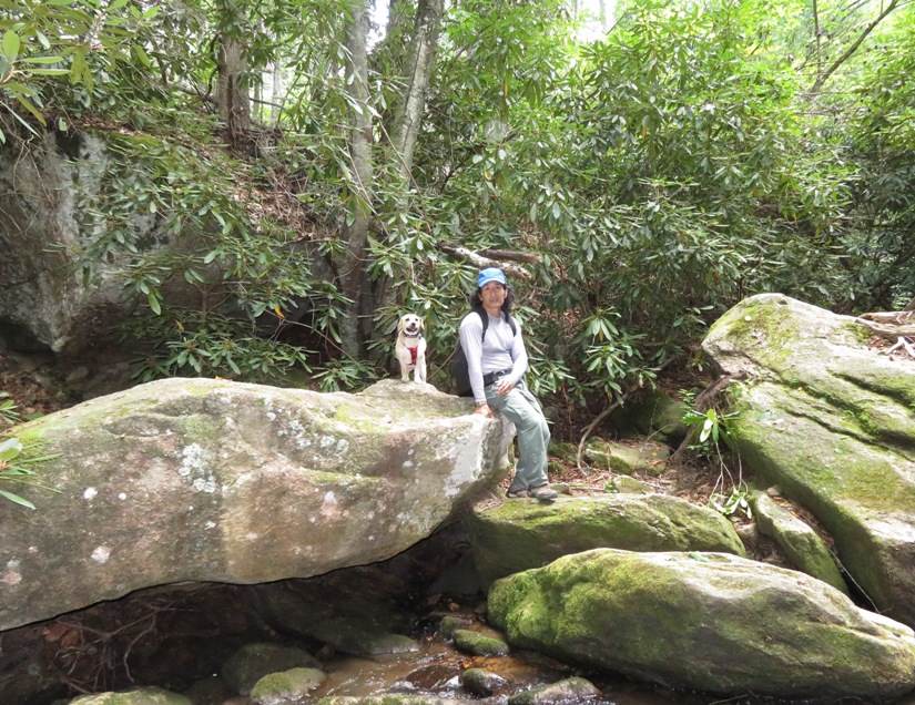 Daphne and I on rocks by the creek