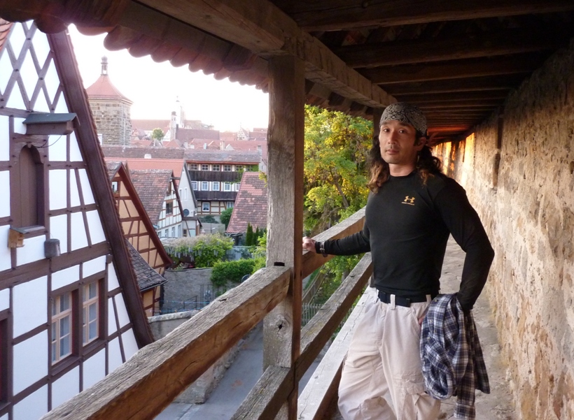 Me with traditional houses on the left