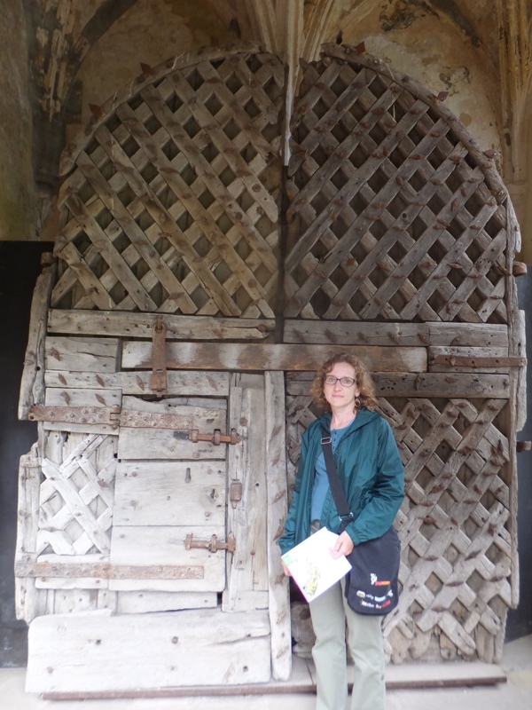 Norma in front of old castle doors