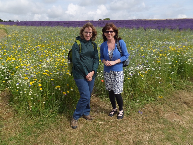 Norma and Sara in front of wildflowers