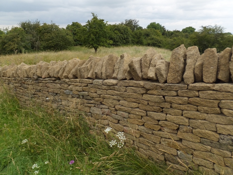 Finished stone fence