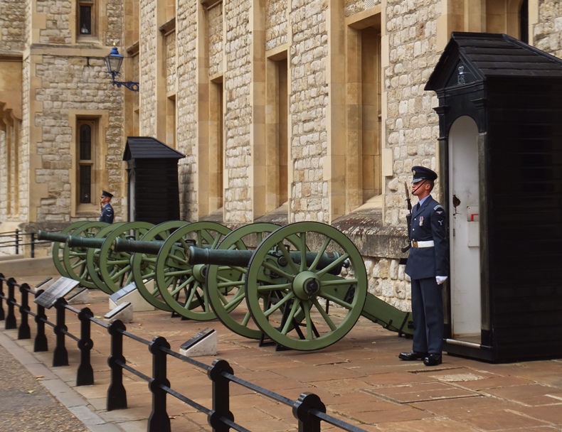 Guards standing at their posts with several cannons