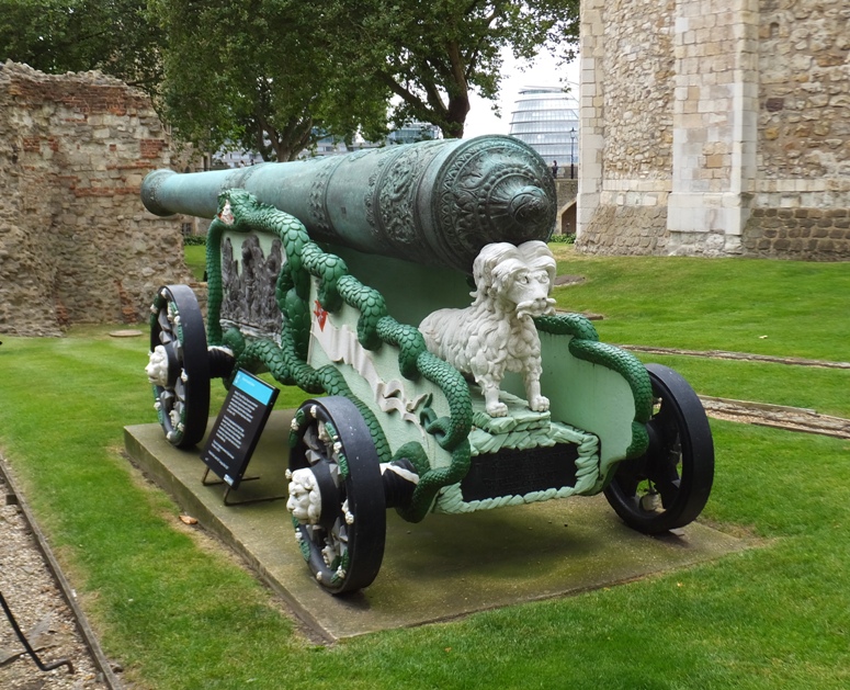 Elaborately decorated cannon with dog sculpture