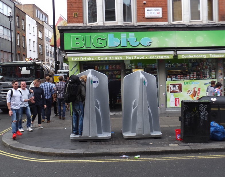 Public urinal in the open on a busy street