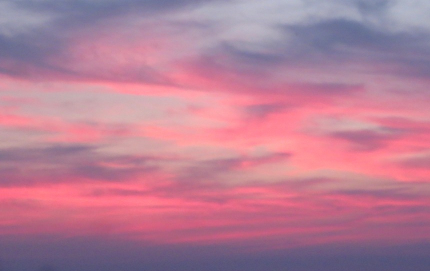 Red clouds illuminated by the setting sun