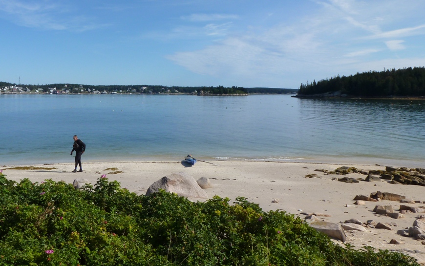 Vince walking on beach