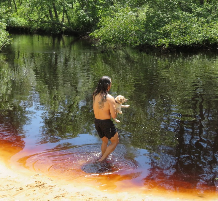Me carrying Daphne into the water