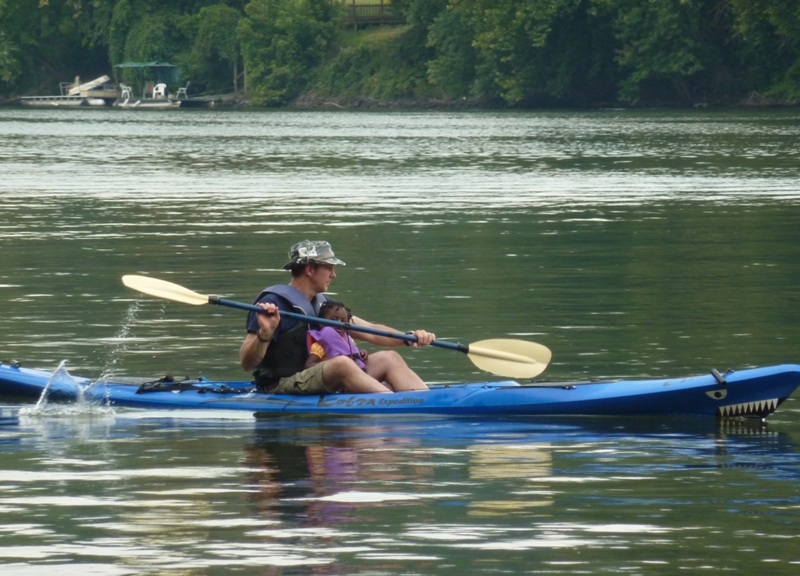 Jimmy and his daughter in the kayak