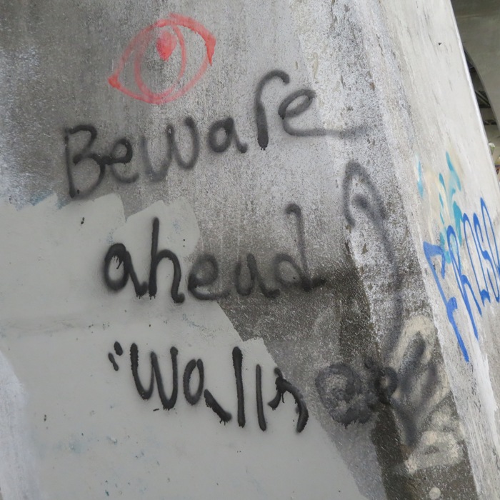 Graffiti under bridge warning of zombies