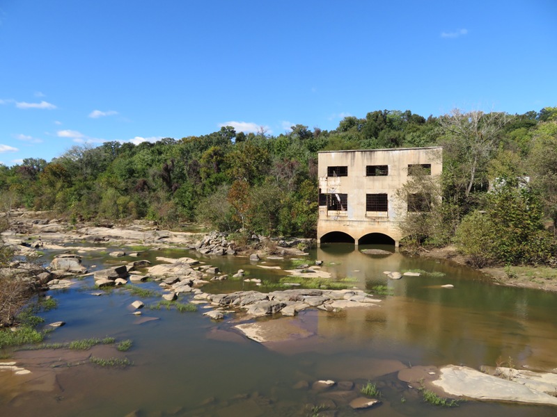 View of building ruin from across the river