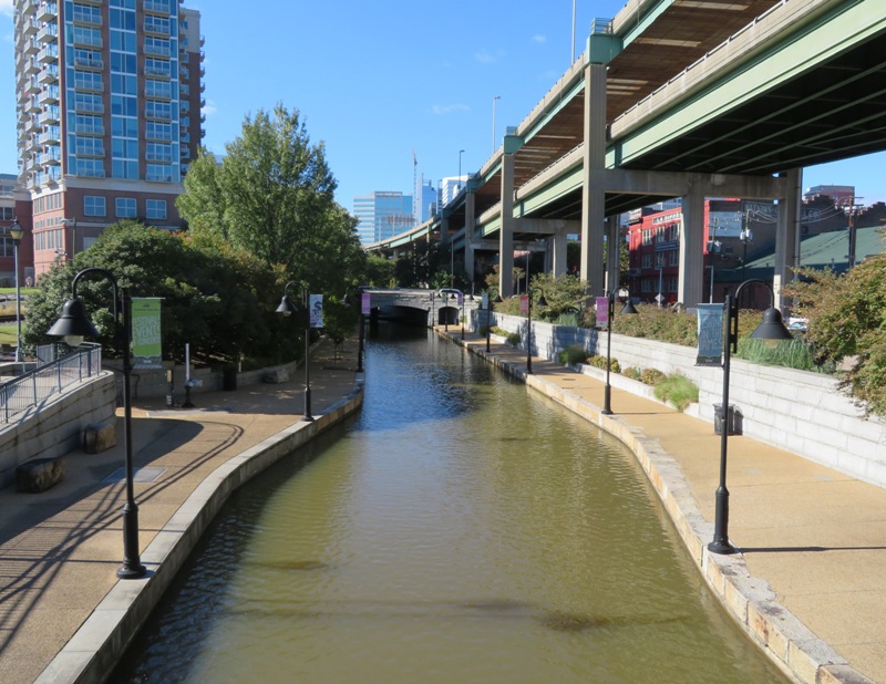 View of canal in urban setting