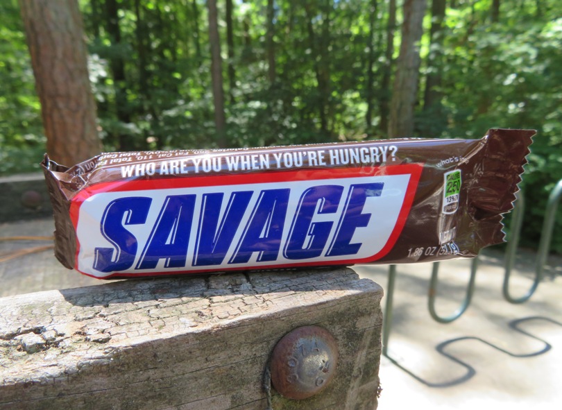 Snickers bar that reads 'Savage'