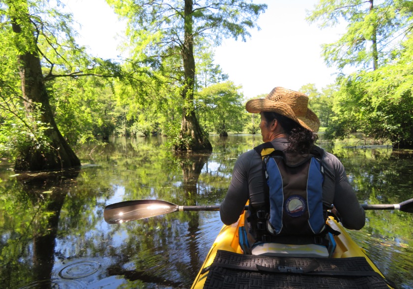 Me on kayak with dramatic lighting