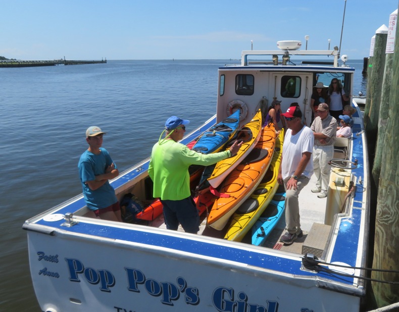 Kayaks and Dr. Greg on power boat