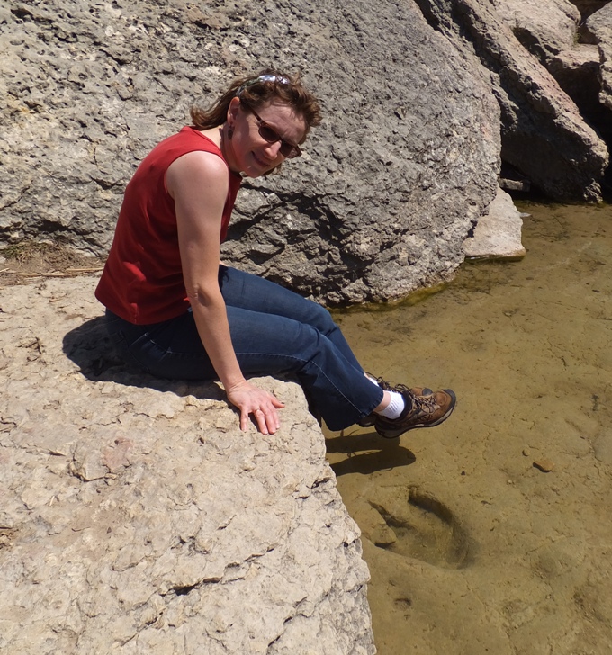 Norma by Acrocanthosaurus footprint