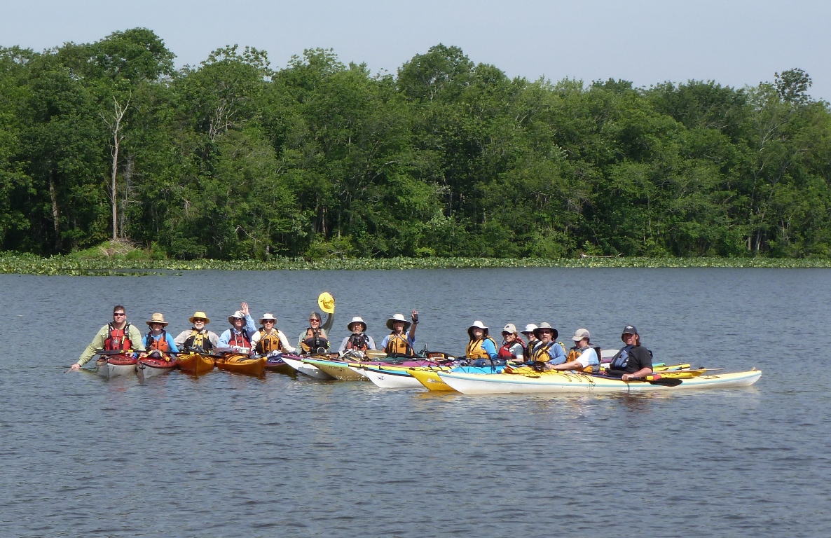 Group photo of 14 kayakers