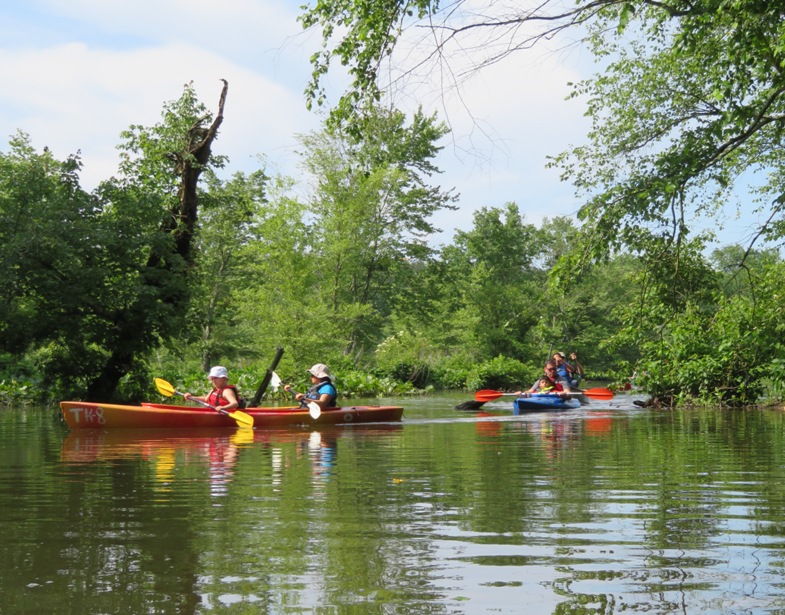 Three boats from our group paddling upstream