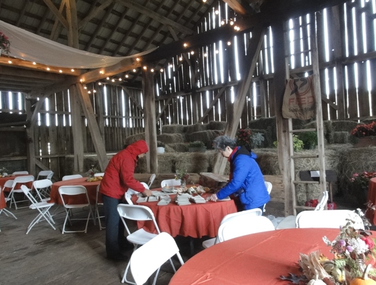 Mom and Dad working in the barn