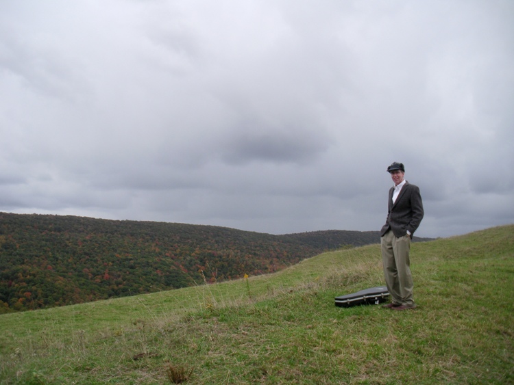 Clark standing in an open field