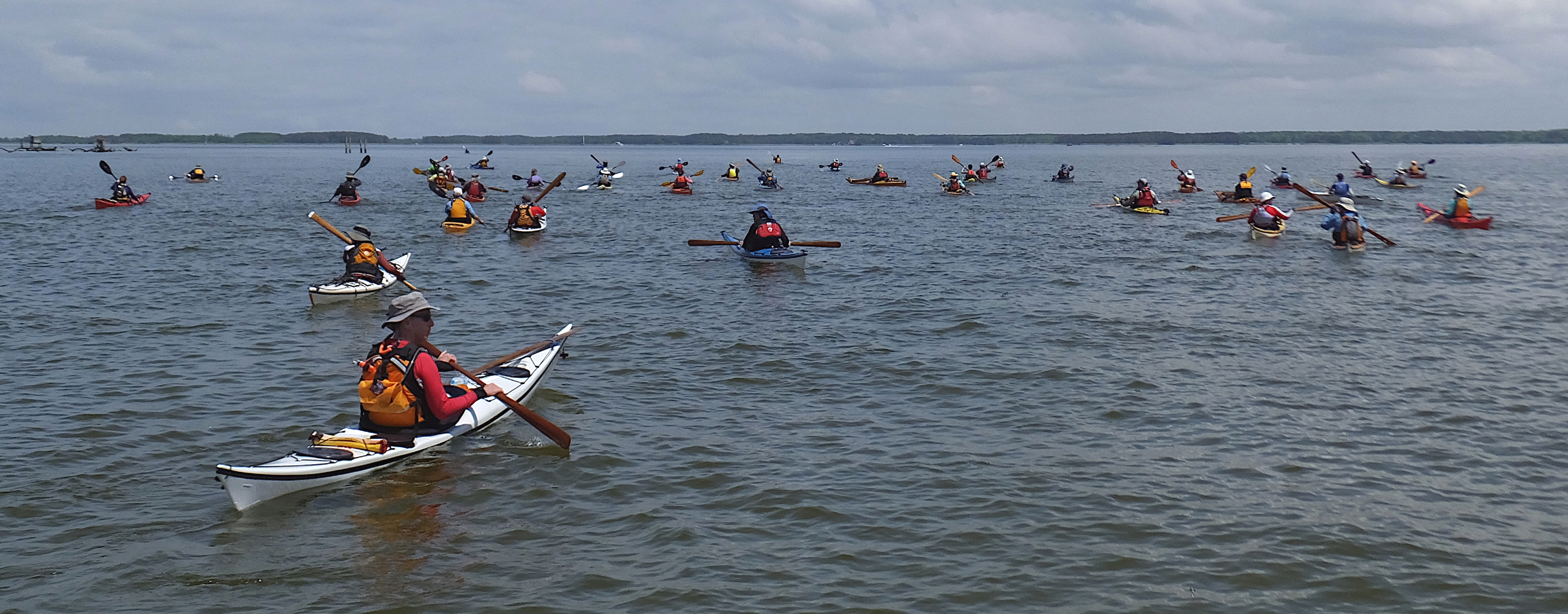 Dozens of kayakers on the water at the May 9, 2015 KIPP