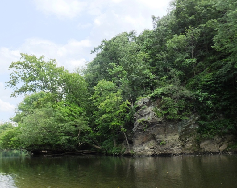 Rocks along the river just upstream of the cave