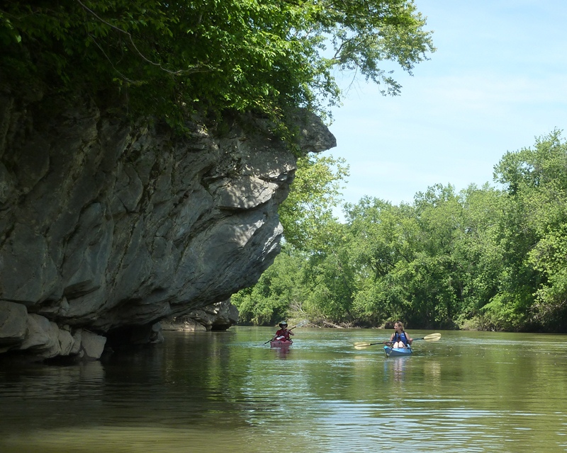 Alex and Francisca kayaking near boulder