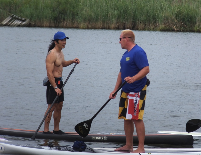 Me talking to Neil with both of us standing on our SUPs